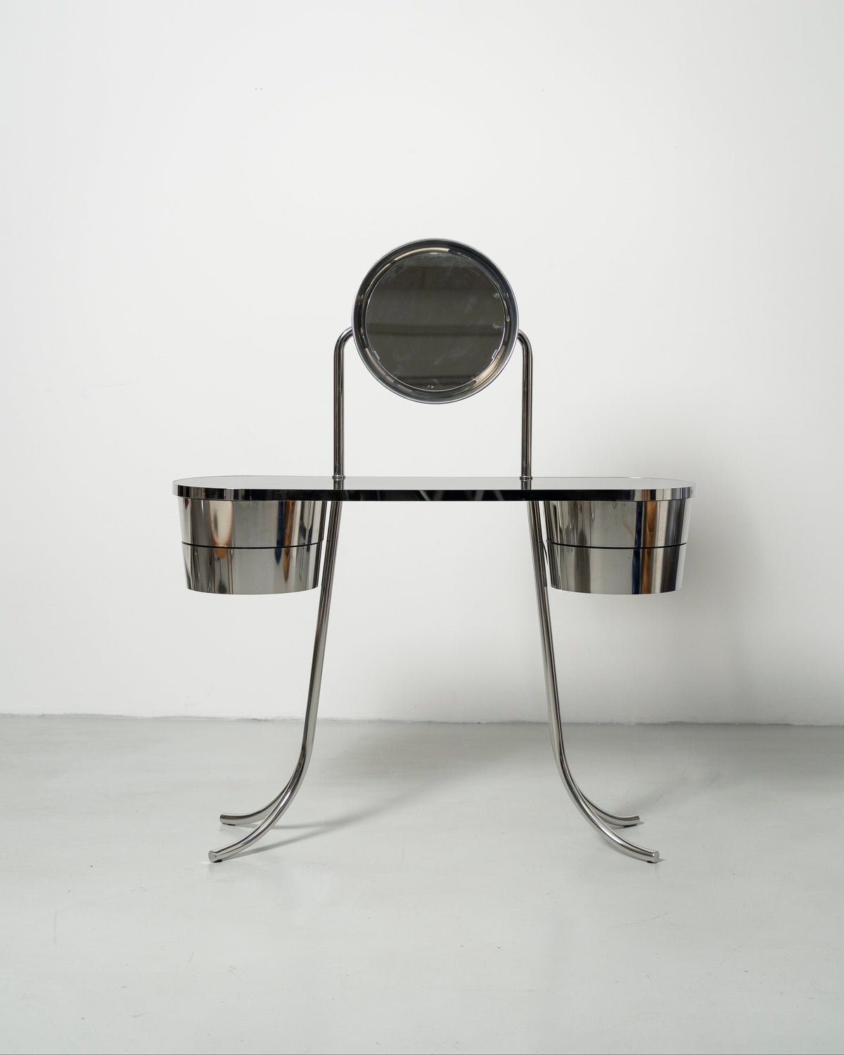 PH Dressing Table Steel by Poul Henningsen, Danish design classic (1919)
steel tube dressing table with two cylindrical containers with drawers and PH Mirror lamp