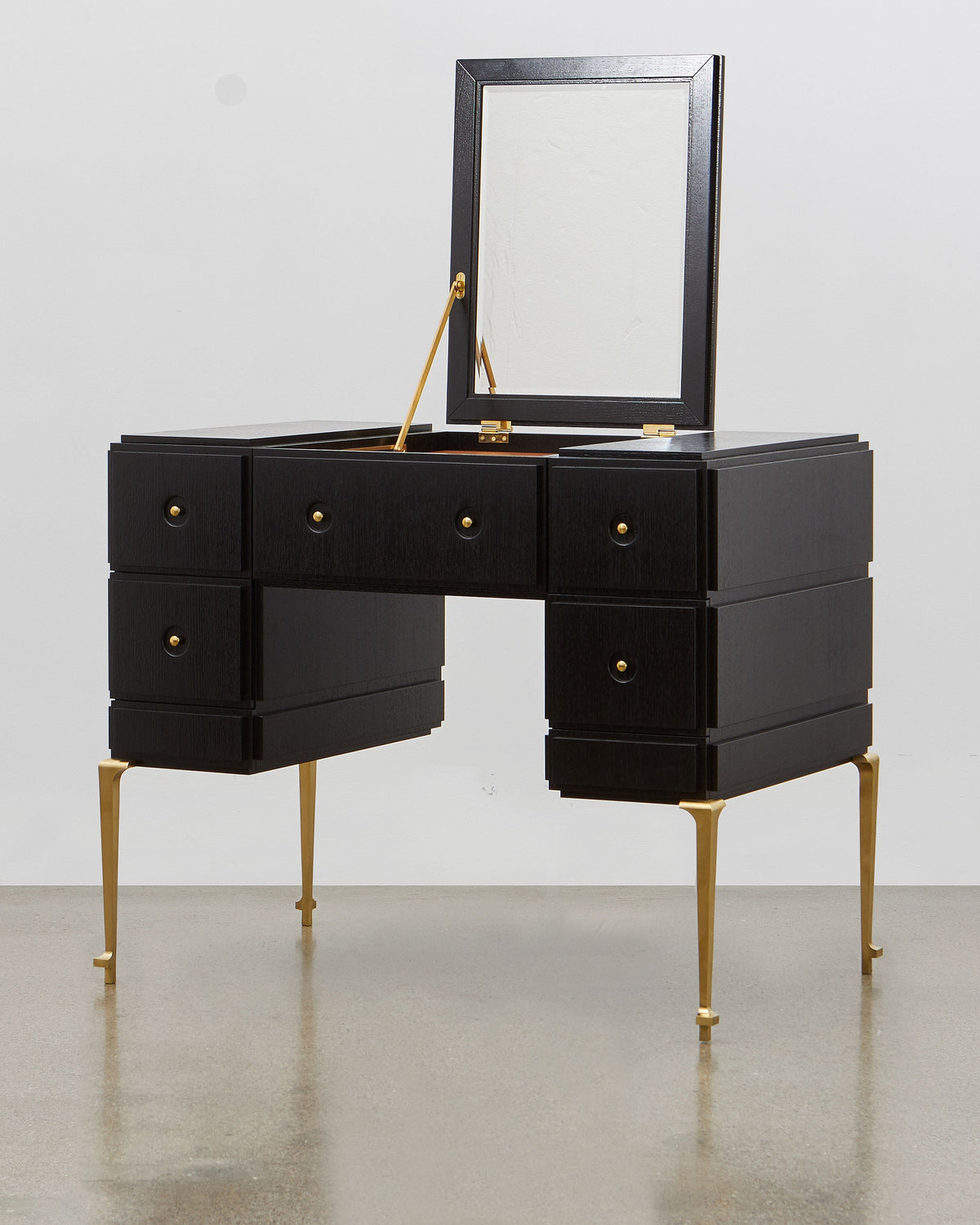 PH Grand Dressing Table by Poul Henningsen, Danish design classic (1919)
Black PH Grand Dressing Table with five drawers and gold-colored accents on the frame and handles, featuring a fold-down mirror.