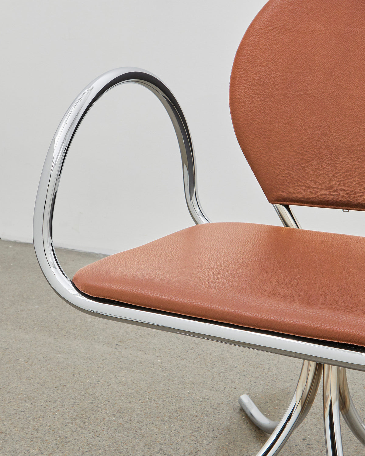 PH Arm Chair by Poul Henningsen, Danish design classic (1932),A armchair with a walnut cushioned seat and backrest, and chrome steel tube frame.