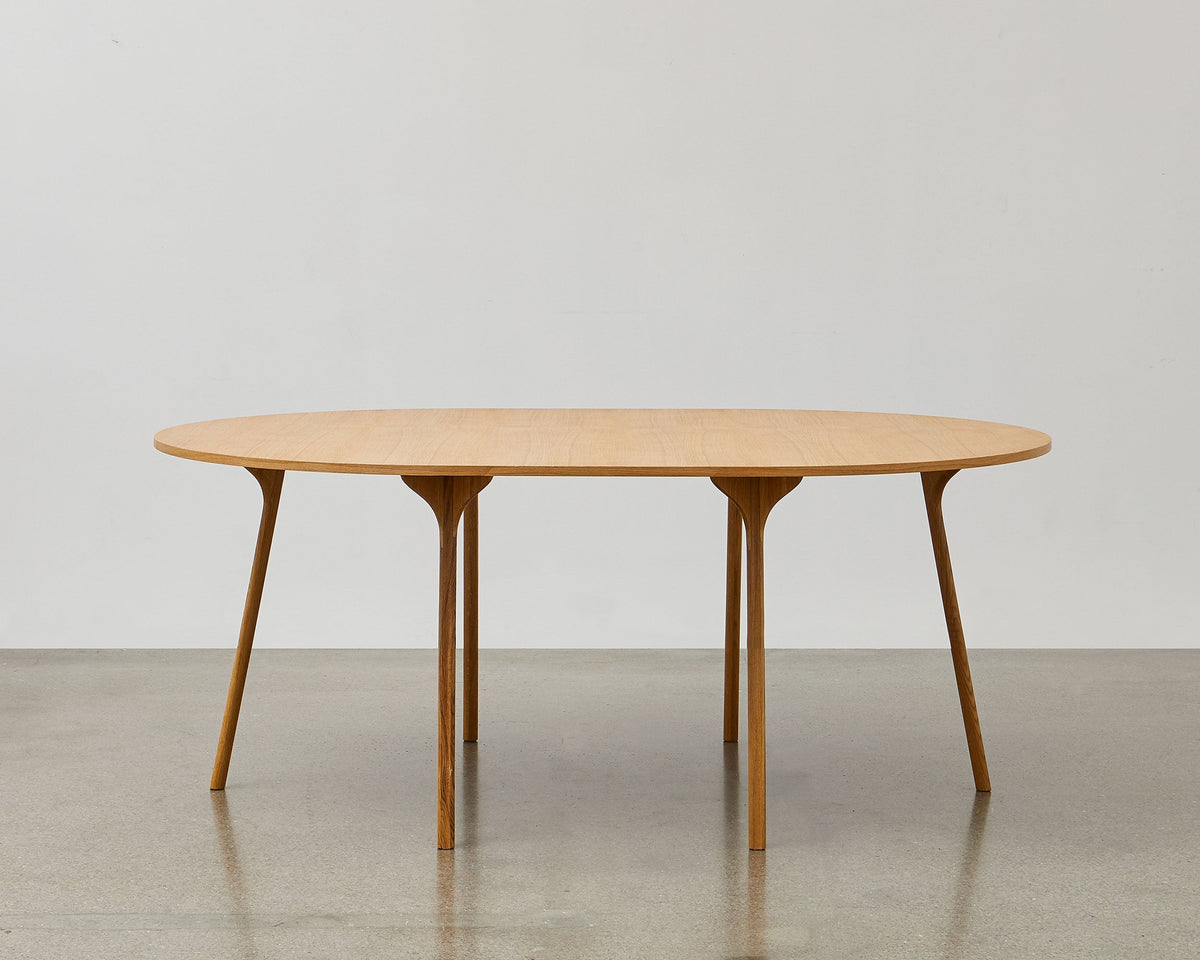 PH Circle Table by Poul Henningsen, Danish design classic (1937)
A minimalist round table with wooden legs and tabletop