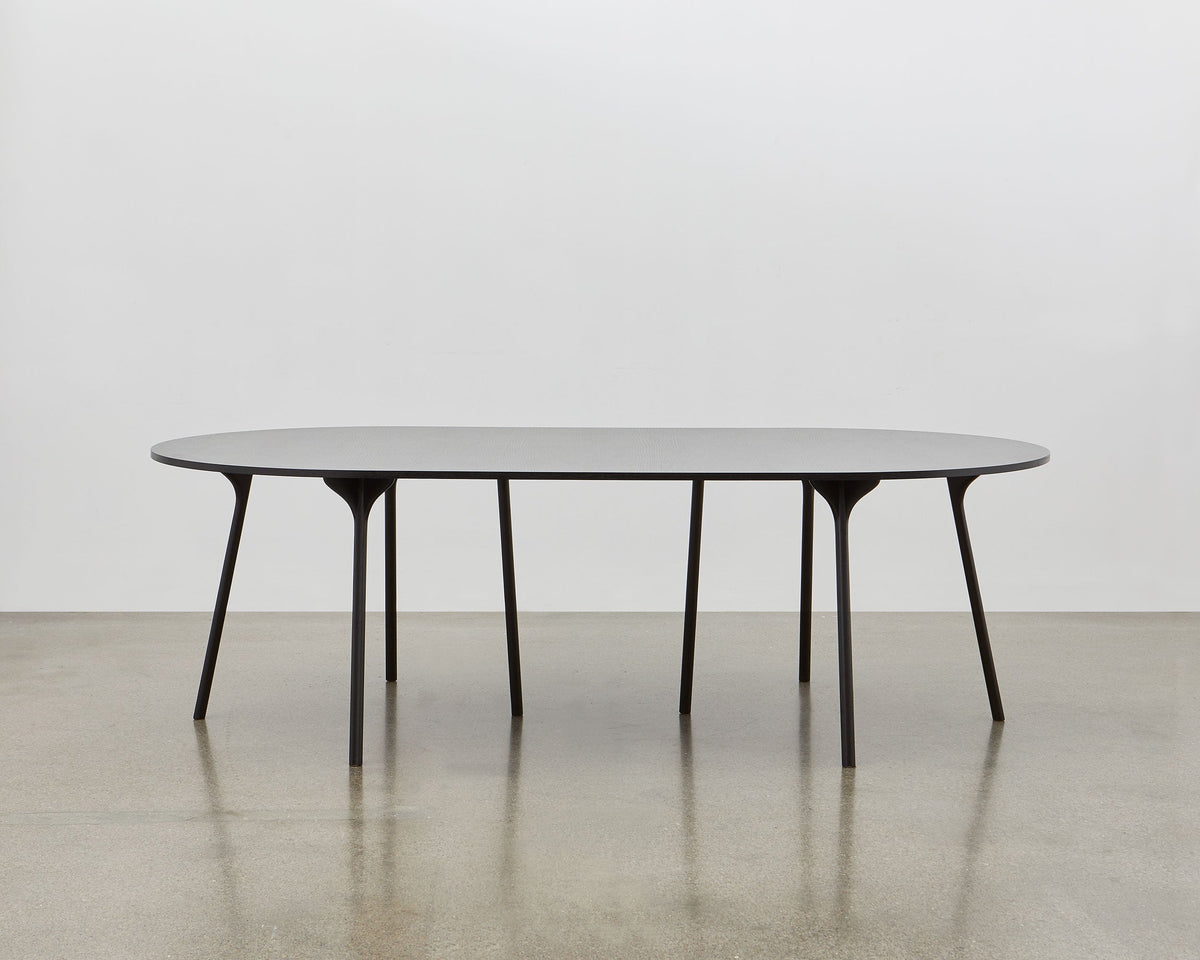 PH Circle Table by Poul Henningsen, Danish design classic (1937)
A minimalist table with black wooden legs and tabletop