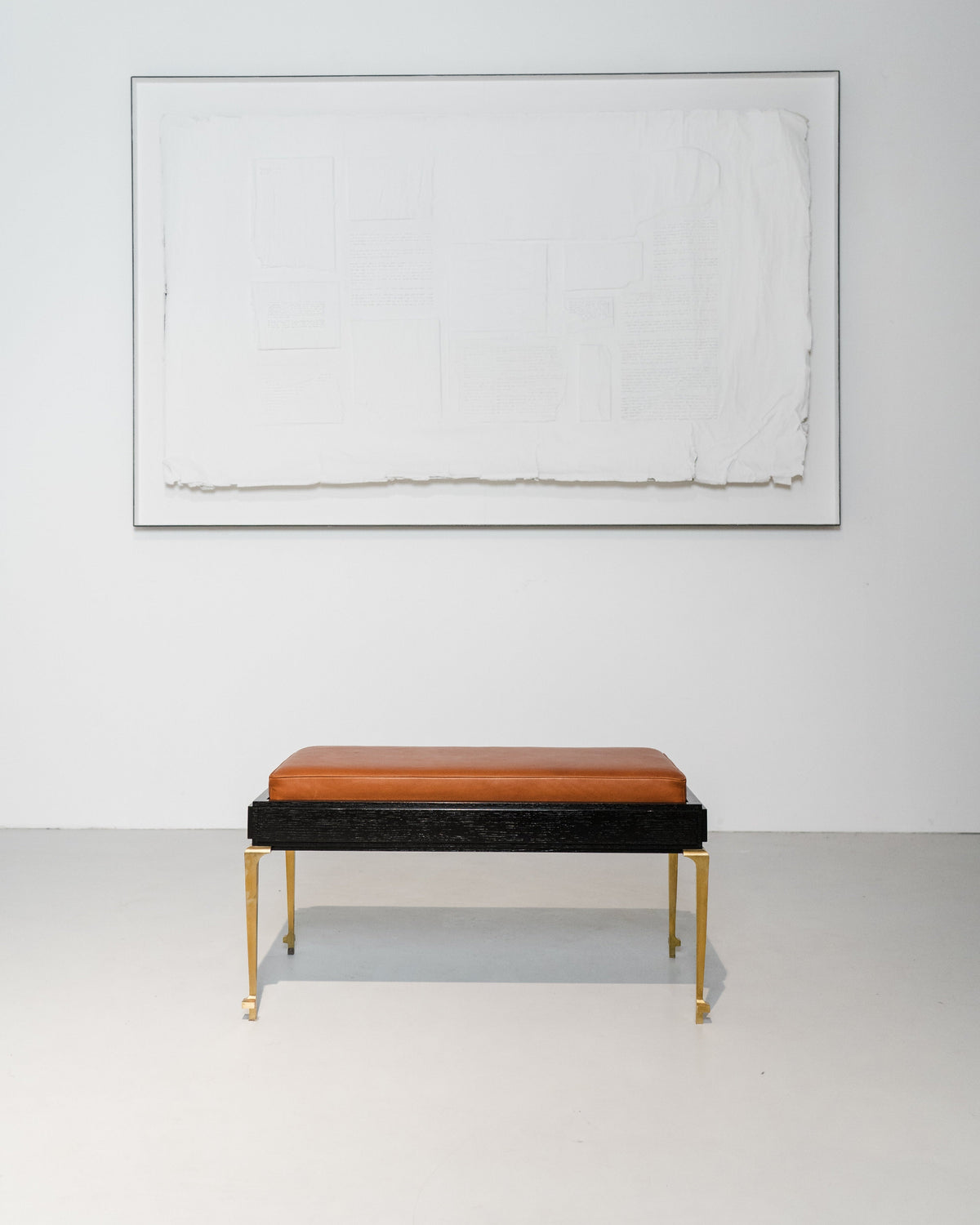 PH Bench by Poul Henningsen, Danish design classic (1930s) Bench with brown leather seat and black frame with brass legs