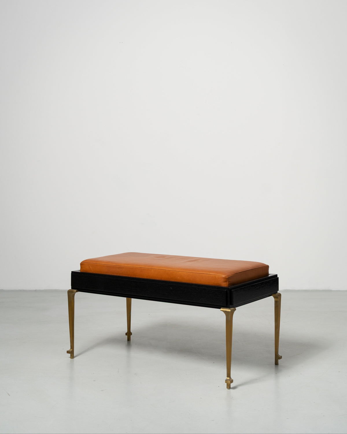 PH Bench by Poul Henningsen, Danish design classic (1930s) Bench with brown leather seat and black frame with brass legs